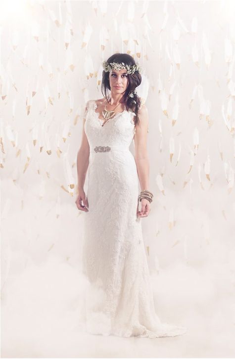 Ethereal bride in gold-dipped feathers