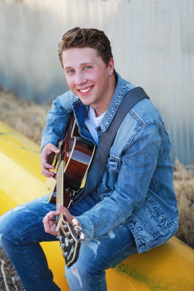 Just a boy and his guitar....