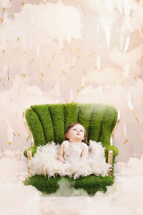 Bo-ho baby in moss-covered chair