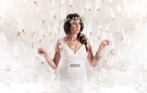 Ethereal bride in gold-dipped feathers