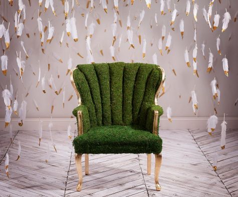 moss-covered, gold-leafed chair, herringbone floor, gold-dipped feathers